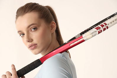 Woman holding tennis racket