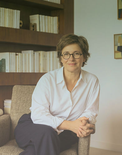 Woman Sitting Thoughtfully