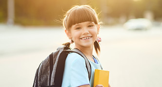 Smiling Girl with Backpack