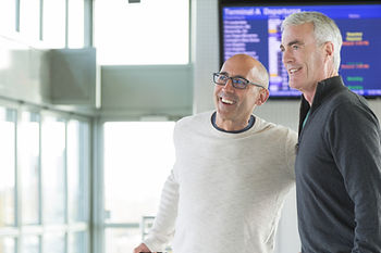 Two men at an airport