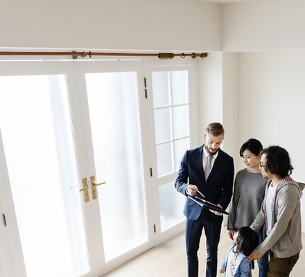 Certified real estate appraiser conducting home appraisal