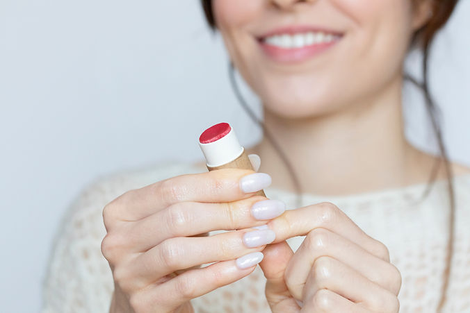 Woman Holding Lip Balm
