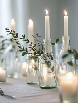Candlelit Bottles with Greenery