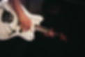 Person Playing Guitar