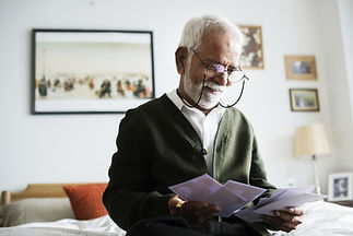 Man looking at Family album