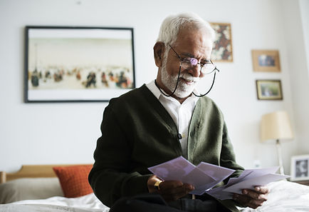 Man looking at Family album
