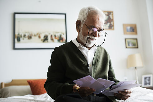 Man looking at Family album