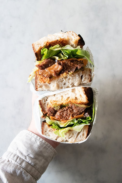 Hand Holding Sandwich