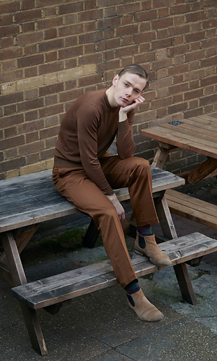 Sitting on a Picnic Table