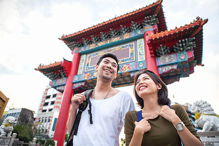 A man and a woman traveling