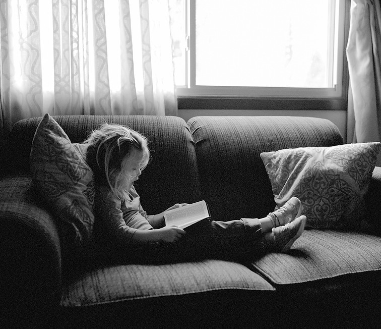 Child Reading grandmas memoir
