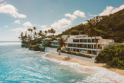 Healthcare assistant accompanying client during recovery at a luxury beach resort