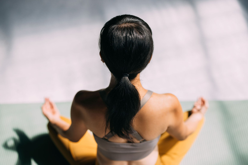A woman practicing meditation