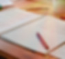 A pen on a pile of documents