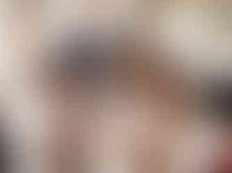 Wedding guests laughing and smiling during reception