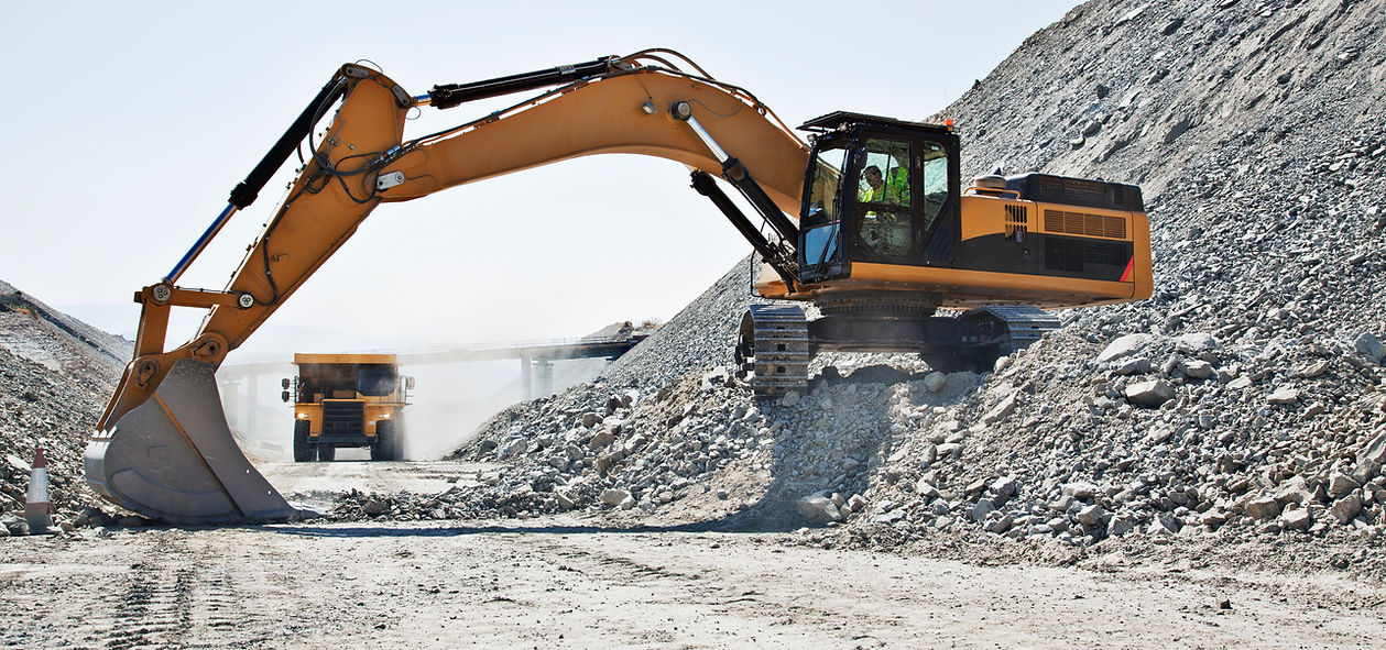 Digger working in quarry