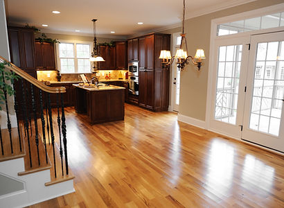 A newly renovated kitchen with hardwood floors