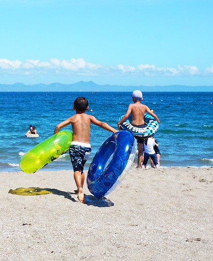 Children Playing by the Sea