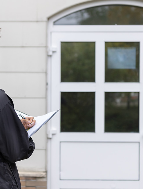 Man Inspecting Entrance