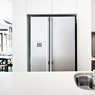 Silver refrigerator in kitchen