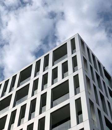 Modern building exterior against a cloudy sky