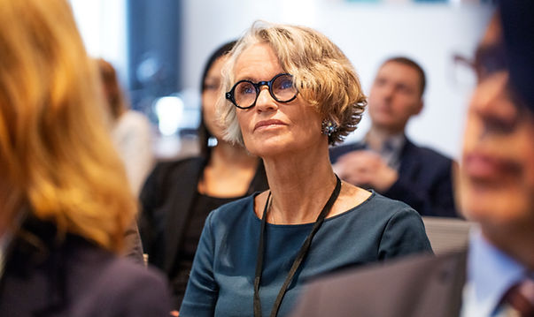 Professional Attending a Seminar
