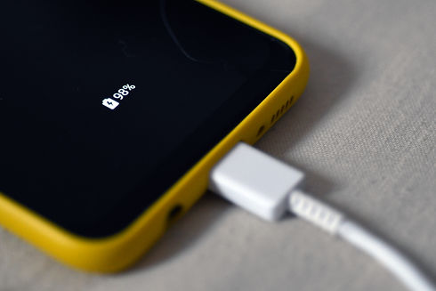 a phone on charge. it's at 98%