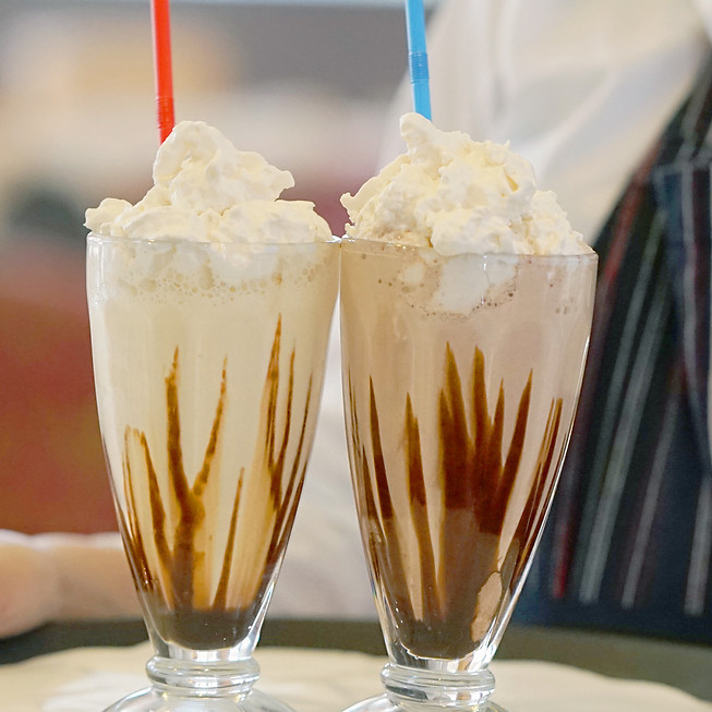 Waitress Carrying Milkshakes
