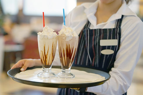 Waitress Carrying Milkshakes