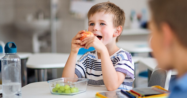 Child eating fruit