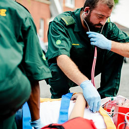Paramedics tending to a patient.