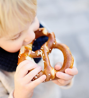 Child Eating Pretzel