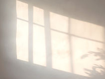 Morning light of window reflected on a wall -, symbolizing healing and clarity after narcissistic abuse.”