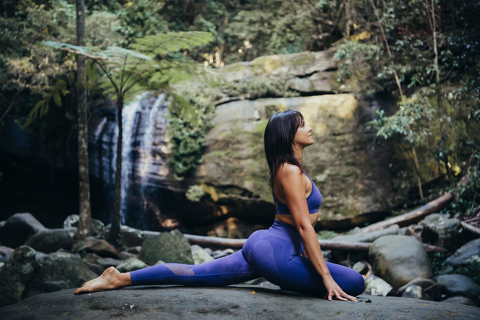 Woman Practicing Yoga Outside