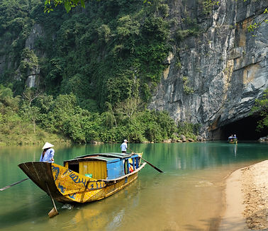 Tourist boats entering Phong Nha cave in Vietnam