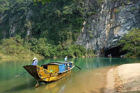 Tourist boats entering Phong Nha cave in Vietnam