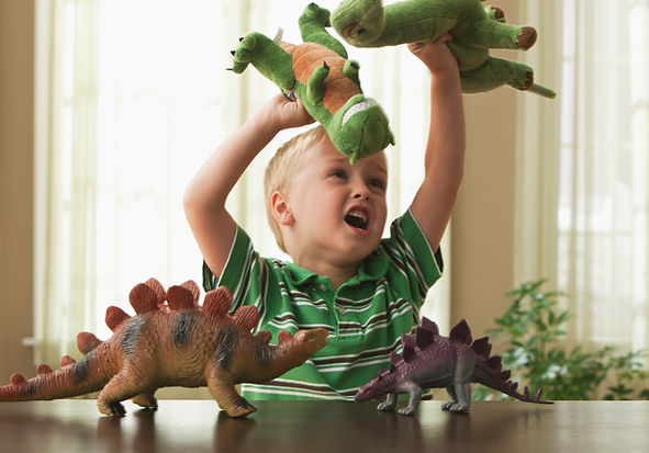 Child Playing Dinosaurs