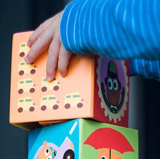 Kid Piling Blocks