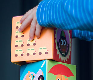 Kid Piling Blocks
