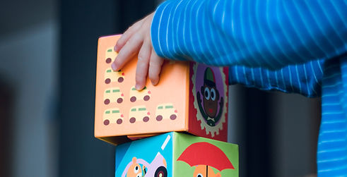 Kid Piling Blocks