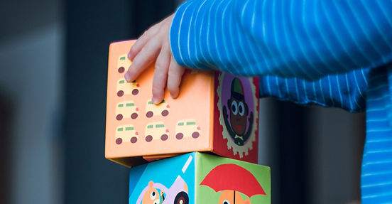 Kid Piling Blocks