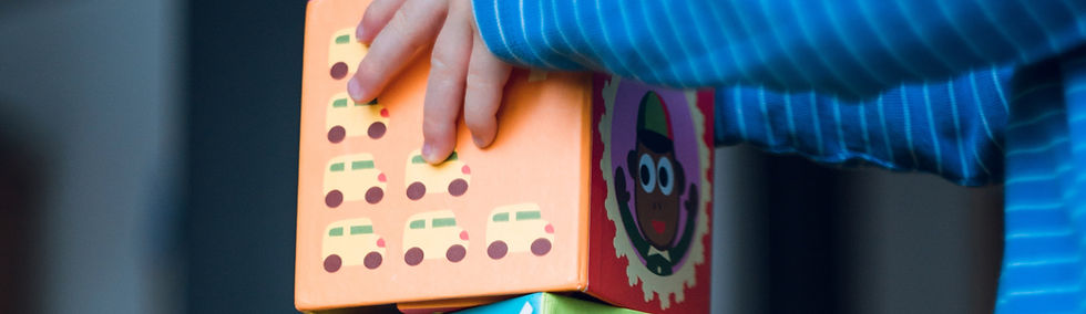 Kid Piling Blocks
