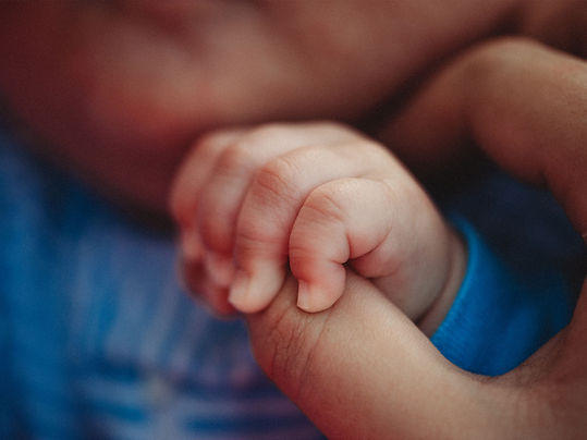 Baby Holding Hand