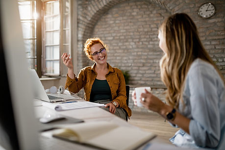 women at table talking
