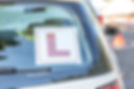 L-plate in car window