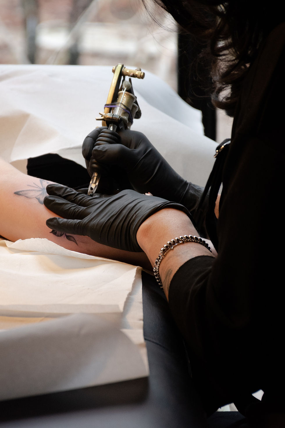 tattooist tattoo artist Bella Heather Gellately of P:latinum Tattoo Kelowna Okanagan Canada