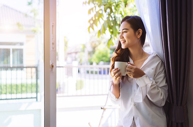 A woman drinking morning coffee
