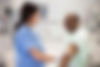 Nurse Assisting Patient