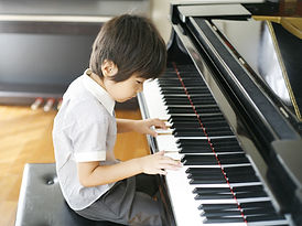 Young Boy Playing the Piano