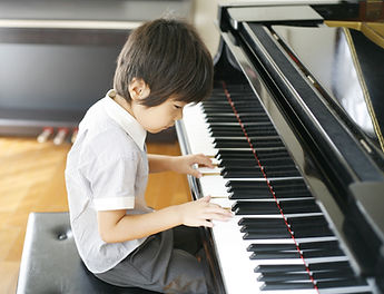 Young Boy Playing the Piano